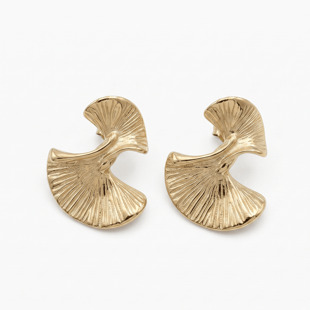 Canyon earrings, a pair of gold-toned, is fan-shaped stud earrings with a textured, ribbed surface.
